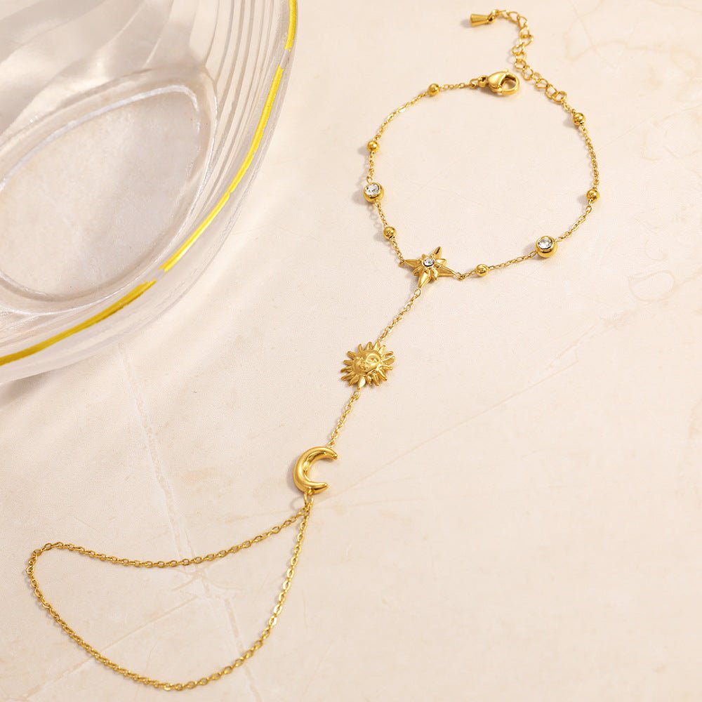 Bijou de main femme acier inoxydable, bracelet bague chaîne dorée, motif soleil lune étoile, accessoire élégant ajustable, modèle Sonnie
