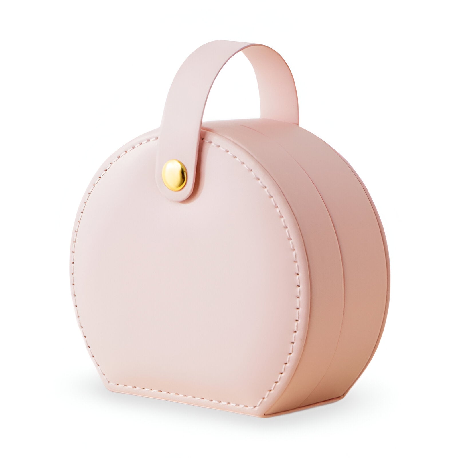 Boîte à bijoux nomade ronde en cuir rose poudré avec anse et bouton doré.