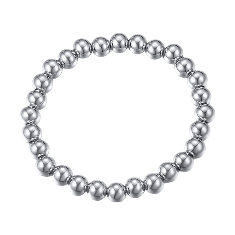 Bracelet élastique en acier inoxydable argenté avec perles polies rondes et lisses.