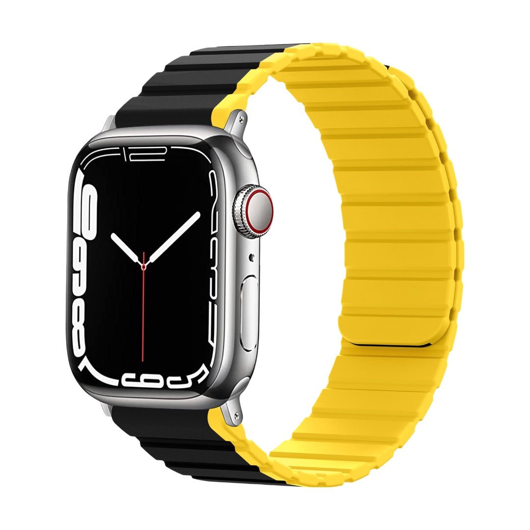Bracelet Apple Watch en silicone bicolore noir et jaune avec fermeture magnétique double face, style moderne et confortable.