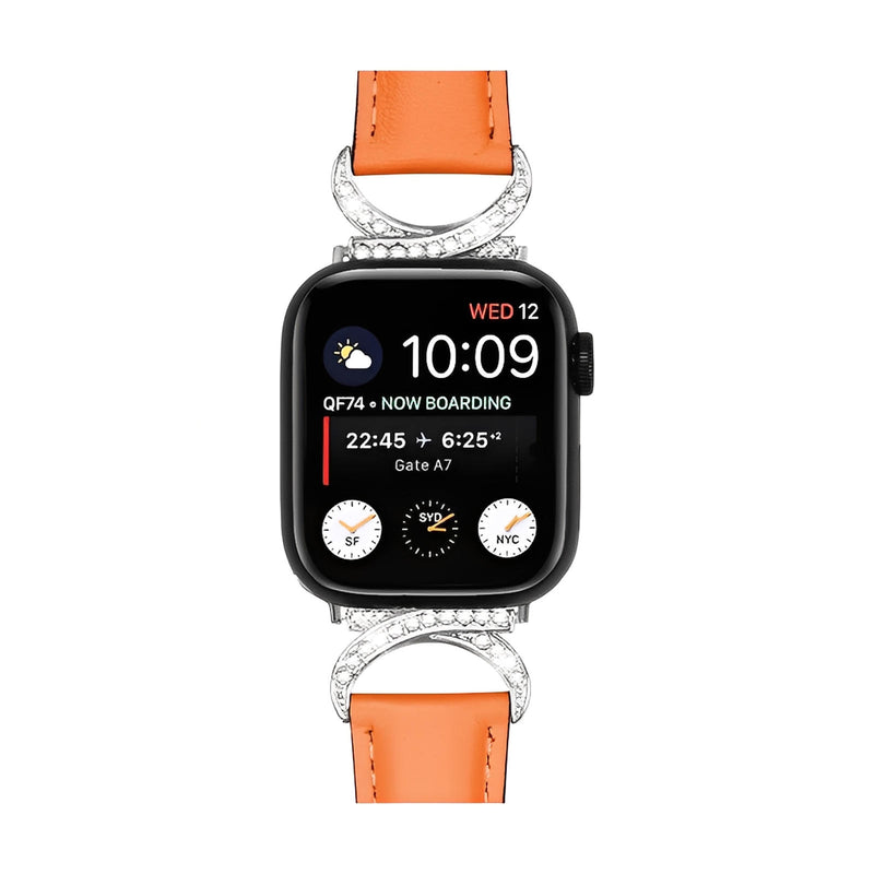 Bracelet en cuir orange pour Apple Watch, boucle en C argentée ornée de strass, style féminin élégant.