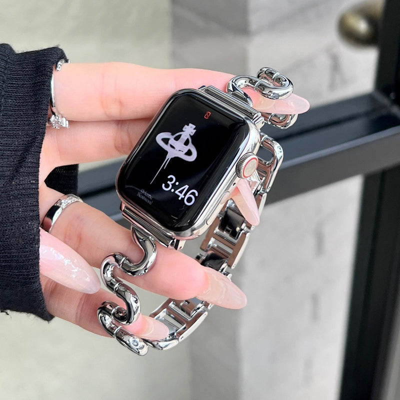 Apple Watch bracelet with wavy metal links, modern S-shaped design, adjustable push-button clasp, Sydia model