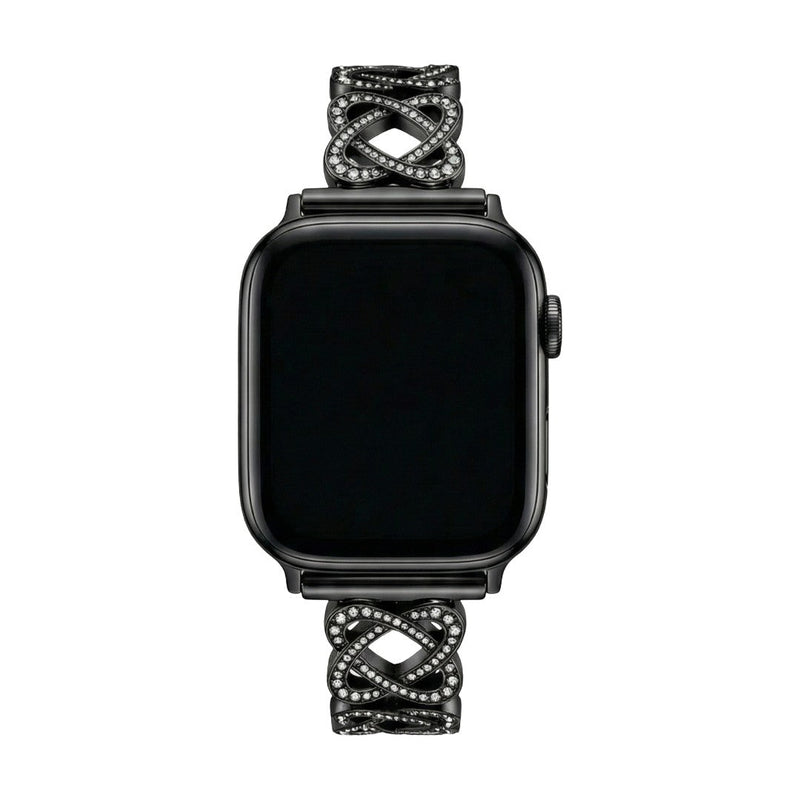 Pulseira para Apple Watch em metal prateado com malhas entrelaçadas, motivo de nó infinito cravejado de zircónias, fecho de encaixe ajustável, modelo Zergone