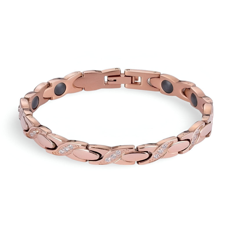 Bracelet femme en titane or rosé avec pierres hématite noires et détails brillants entrelacés.