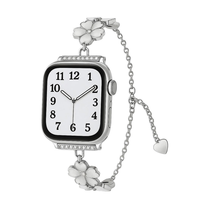 Bracelet chaîne métallique argenté pour Apple Watch, ornée de fleurs de cerisier délicates, design floral féminin.