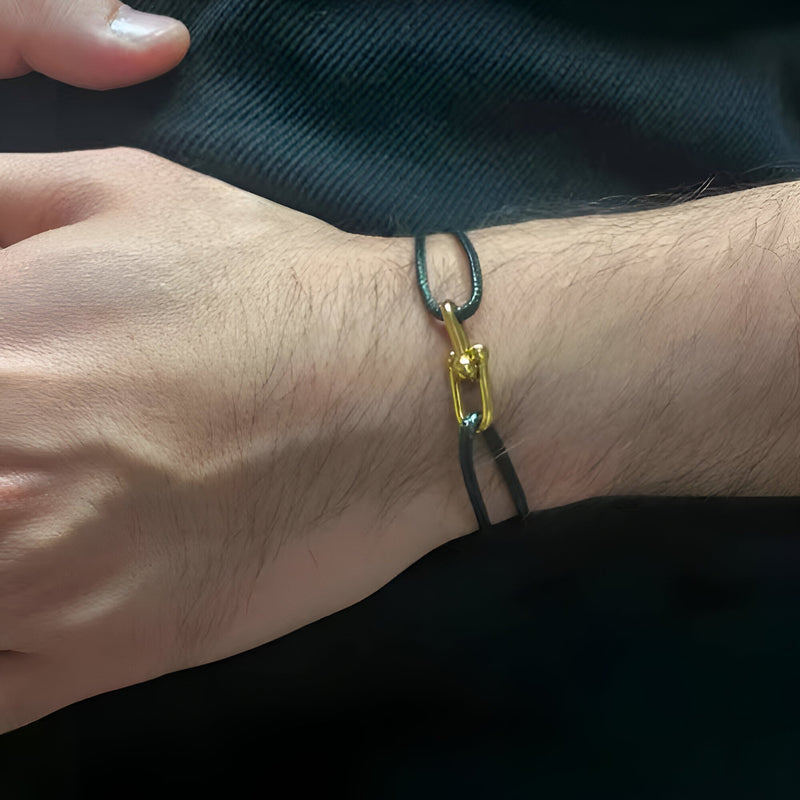 Pulsera de cordón con eslabones dorados cruzados, modelo Verity