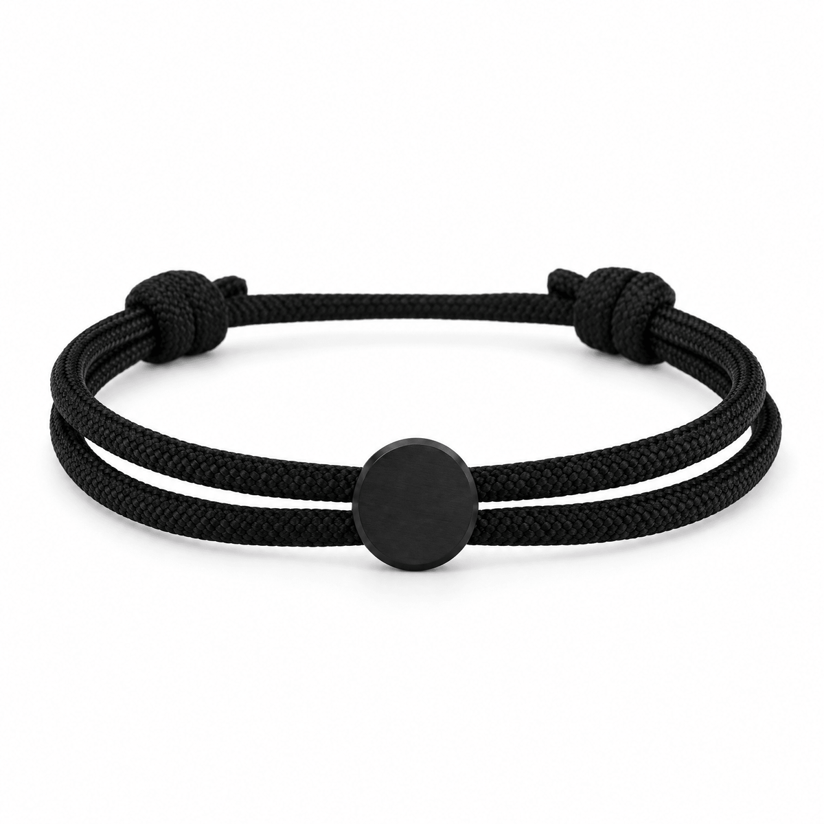 Bracelet Marsin Noir et noir, cordon ajustable et pastille ronde, posé de face sur fond blanc