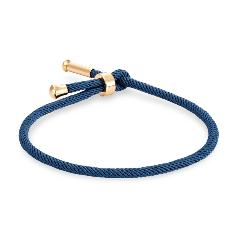 Bracelet cordon bleu marine avec détails en titane plaqué or minimaliste modèle Frémi.