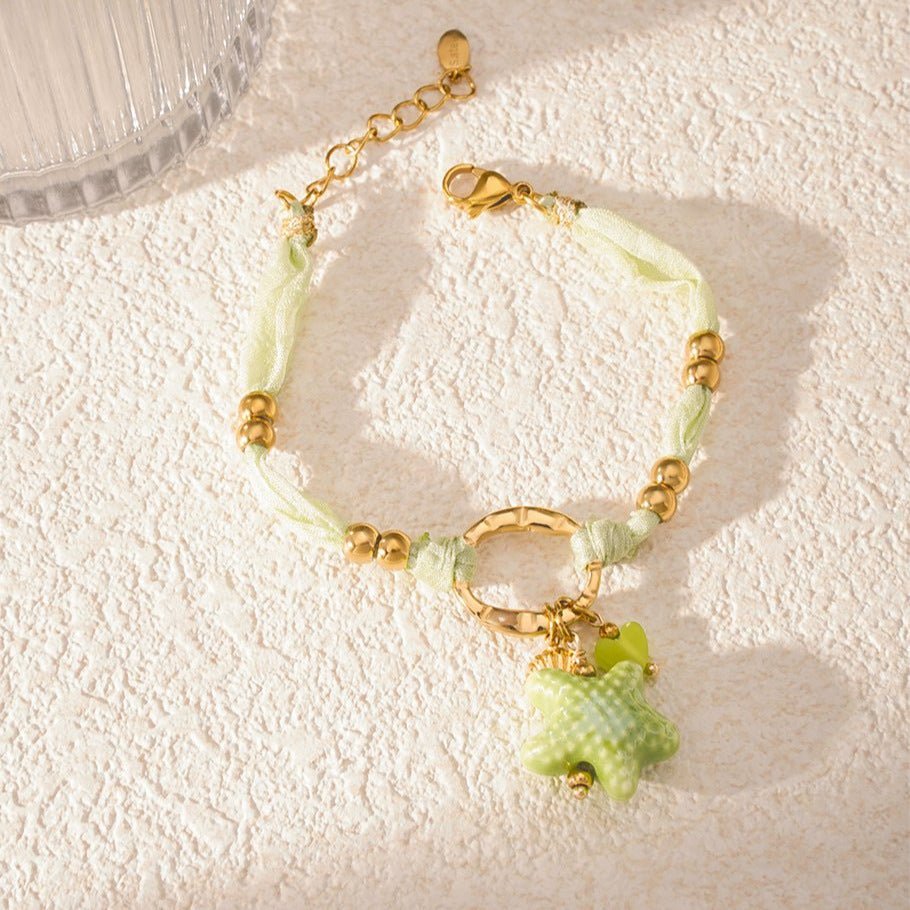 Bracelet cordon d'amour, aux multiples charms dorés, en acier inoxydable, pour femme, modèle Lalama - La Boutique du Bracelet