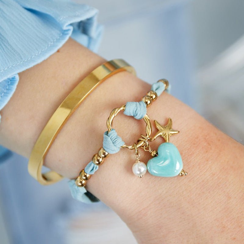 Bracelet cordon d'amour, aux multiples charms dorés, en acier inoxydable, pour femme, modèle Lalama - La Boutique du Bracelet