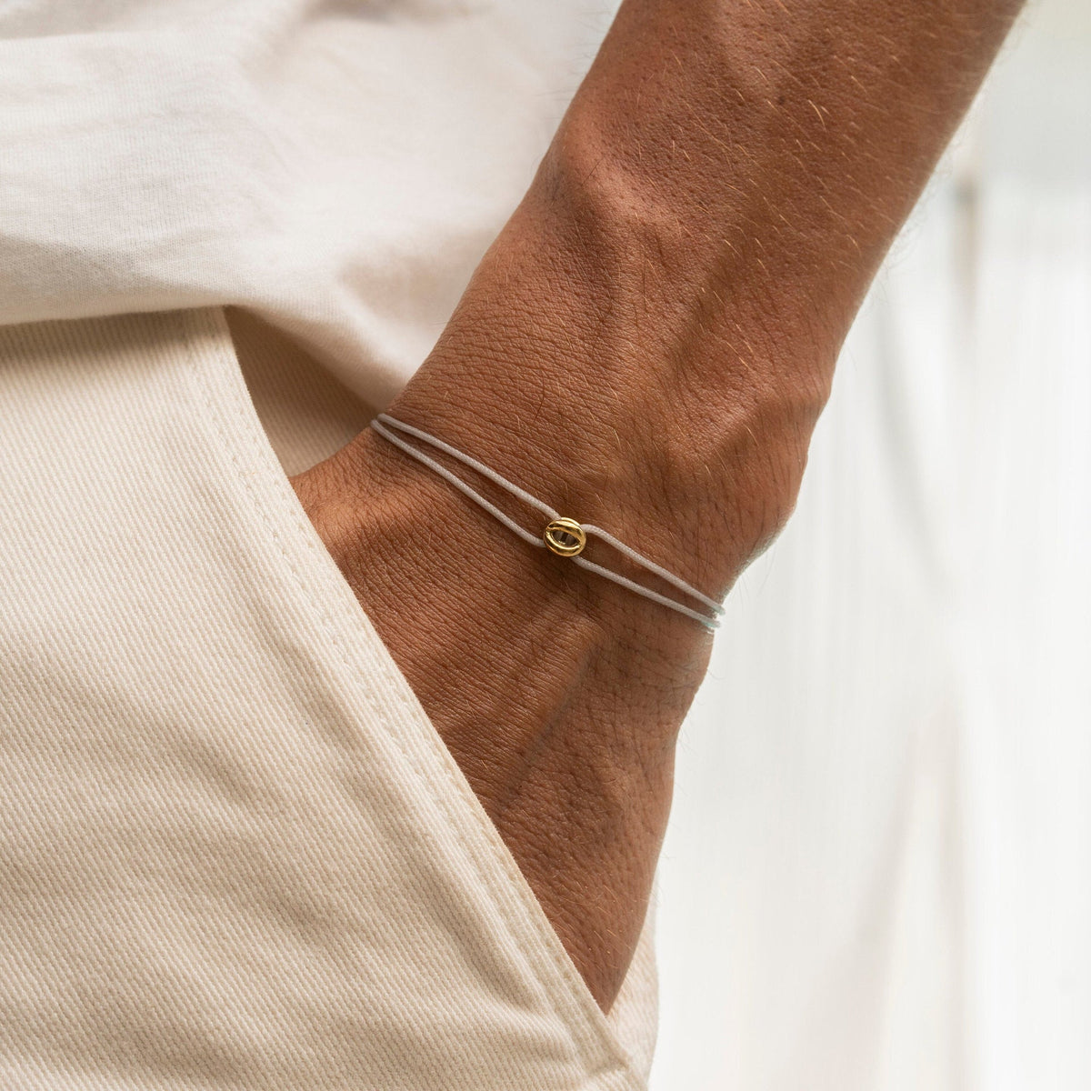 Adjustable double-cord bracelet, intertwined round symbol in gold, elegant minimalist jewelry for men and women, Sunny model