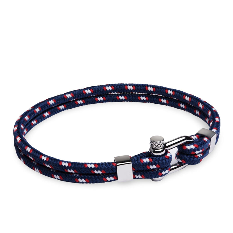 Bracelet cordon double bleu marine à motifs blancs et rouges avec mousqueton en acier inoxydable.