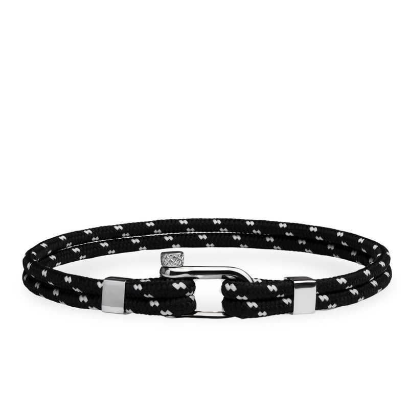 Bracelet cordon noir avec motifs blancs et fermoir mousqueton en acier inoxydable pour homme.