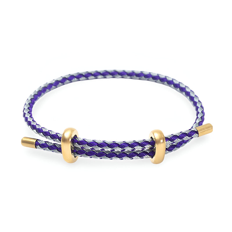 Bracelet cordon violet et gris avec détails en acier inoxydable doré, style authentique.