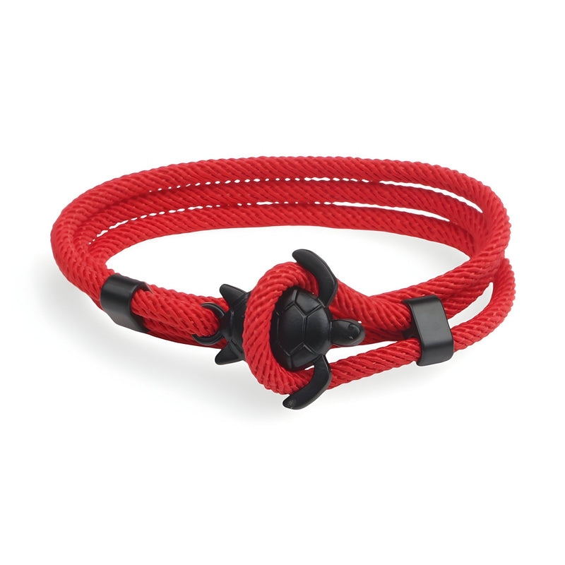 Bracelet cordon rouge avec fermoir noir en forme de tortue, style marin élégant.