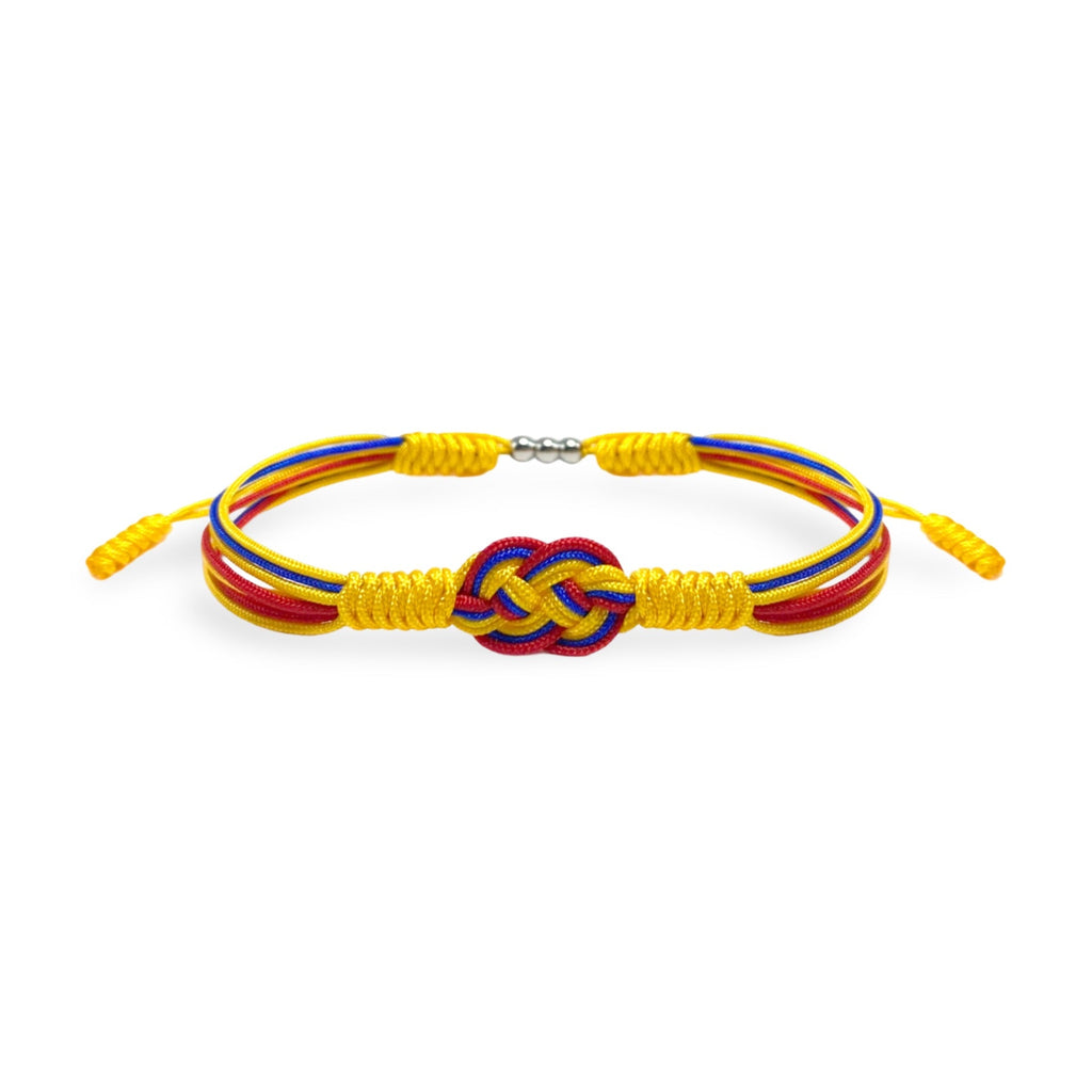 Bracelet cordon jaune, rouge et bleu avec noeud multicolore central, style tressé, modèle Clove.