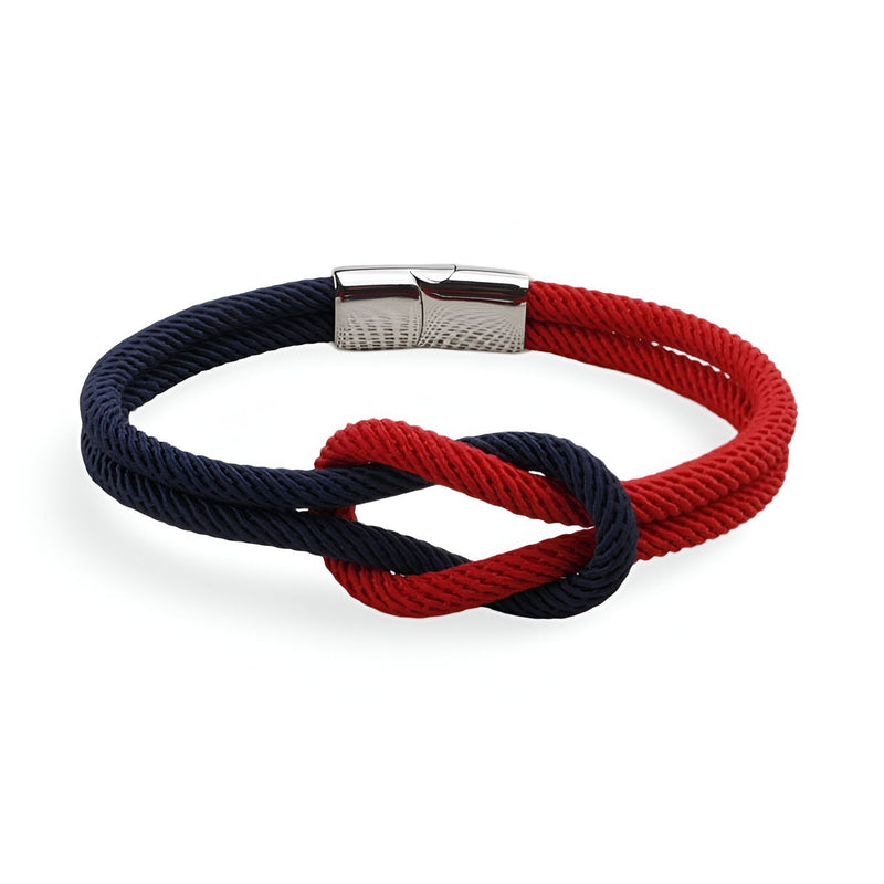Bracelet cordon bi-colore marine et rouge avec noeud et fermoir métallique argenté.