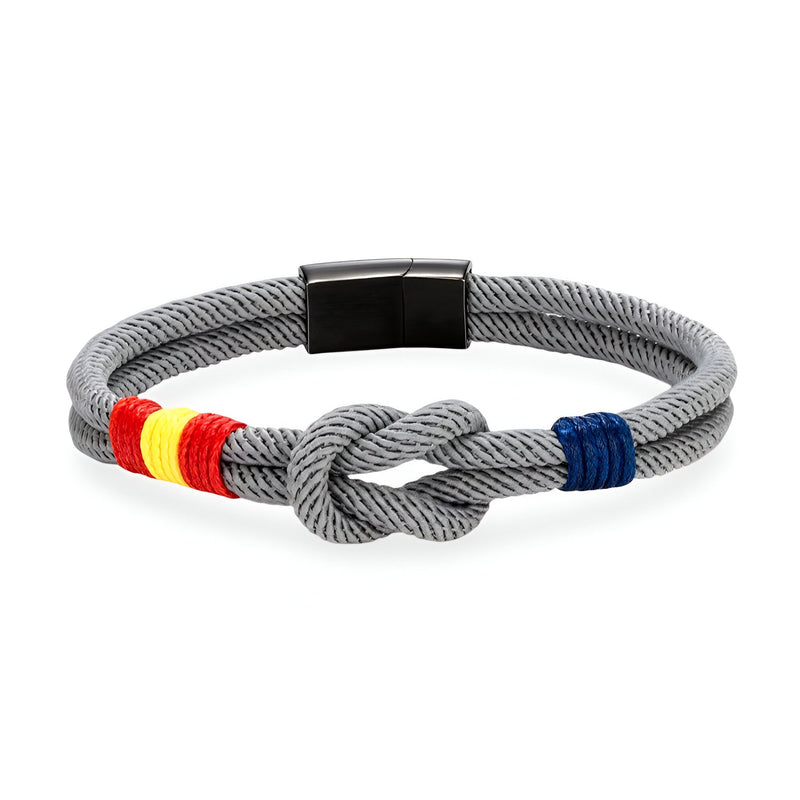 Bracelet cordon gris avec noeud, drapeau espagnol tissé en jaune et rouge, détails bleus en métal noir mat.