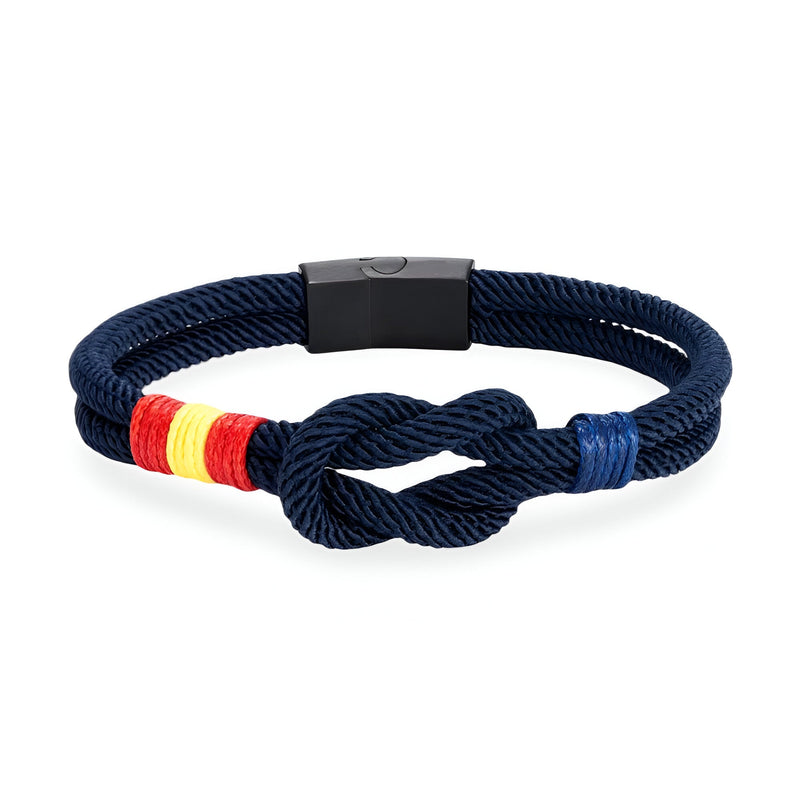 Bracelet cordon bleu marine avec nœud et drapeau espagnol en rouge, jaune et rouge, fermoir noir mat.