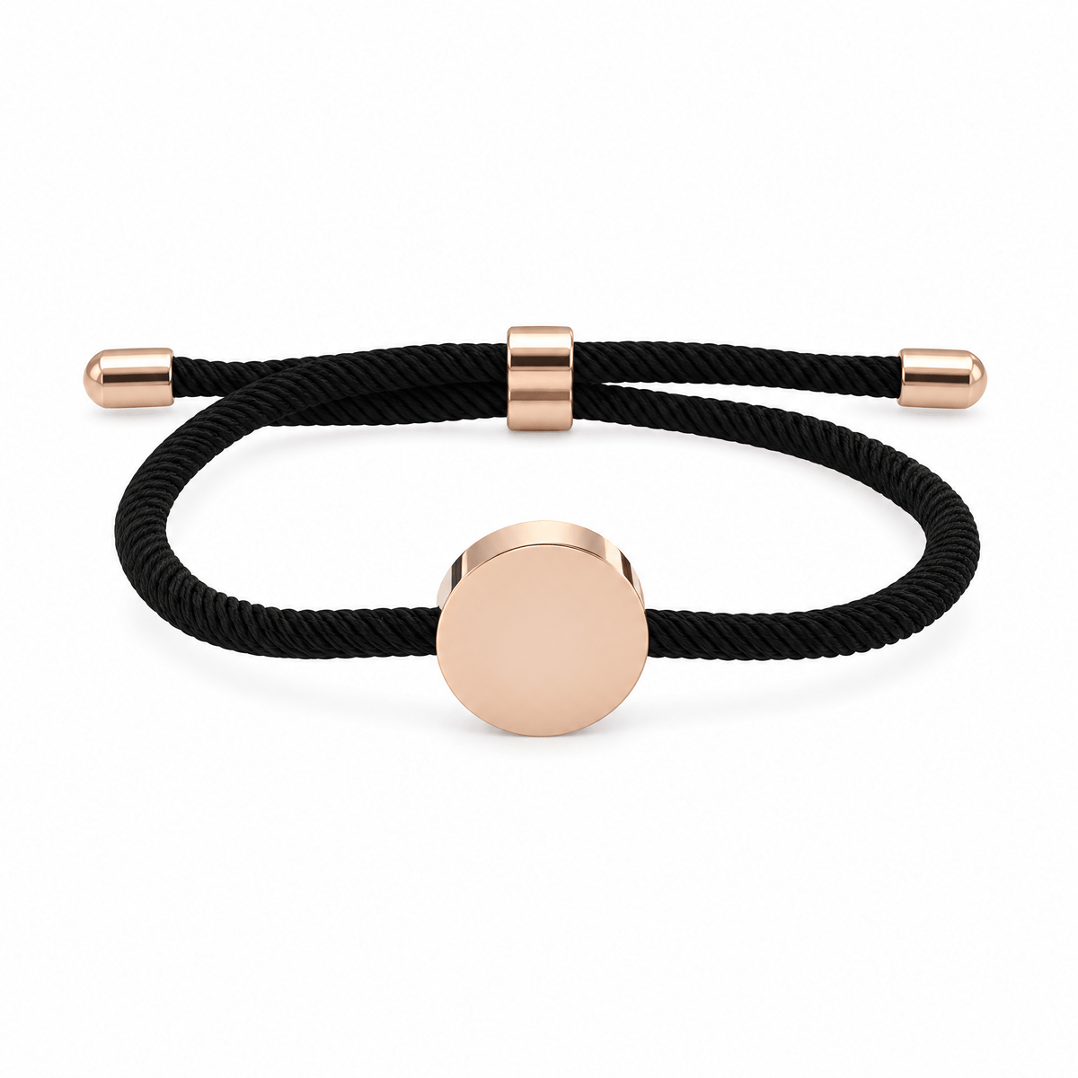 Bracelet Dax Or rosé / Noir, cordon ajustable et médaillon rond, posé de face sur fond blanc