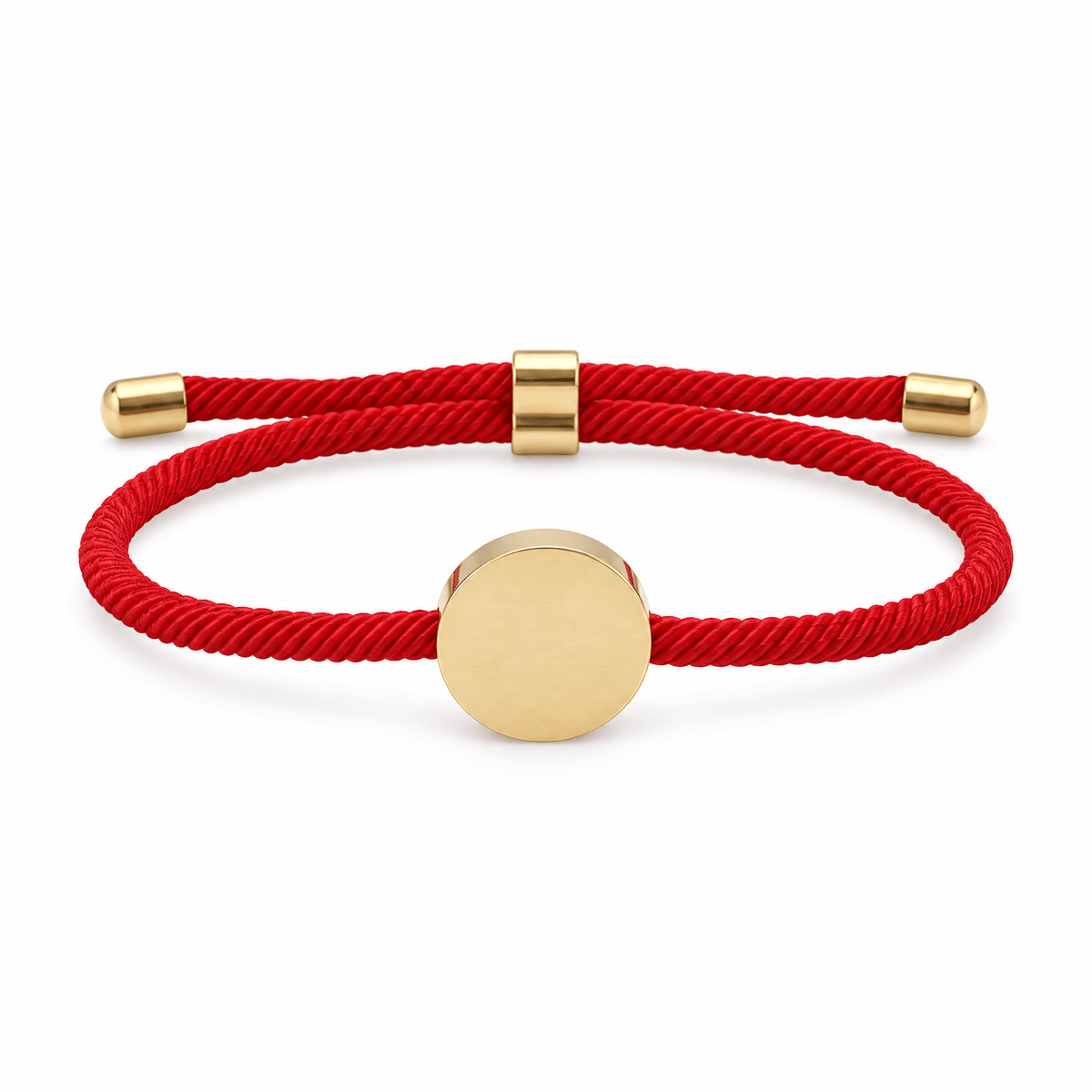 Bracelet Dax Or / Rouge, cordon ajustable et médaillon rond, posé de face sur fond blanc