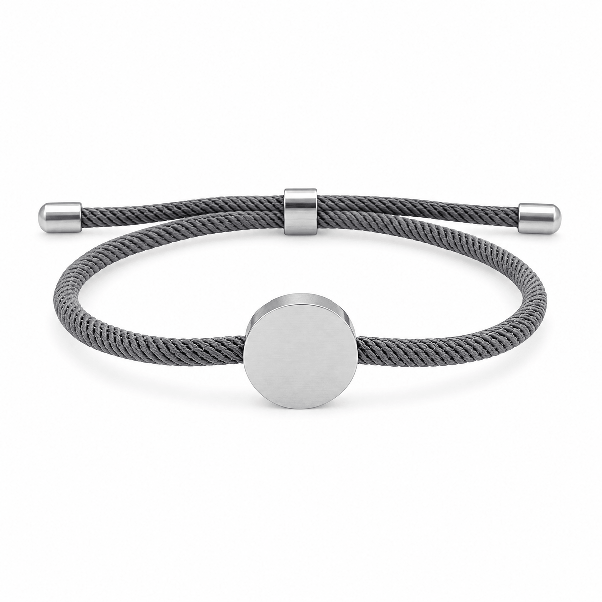 Bracelet Dax Argent / Gris, cordon ajustable et médaillon rond, posé de face sur fond blanc