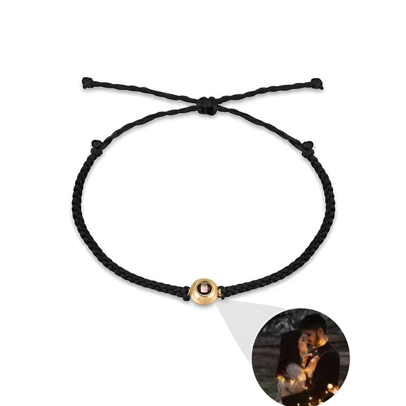 Bracelet personnalisé noir en corde avec médaillon photo rond en titane or rosé ajustable.