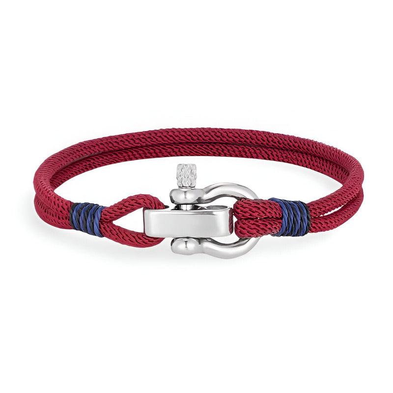 Bracelet cordon bordeaux avec manille en acier inoxydable et finitions bleues contrastantes.