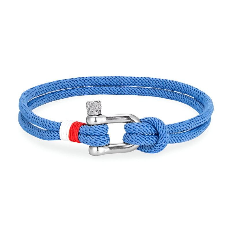 Bracelet homme cordon bleu avec manille inoxydable et détail rouge blanc sur le nœud.