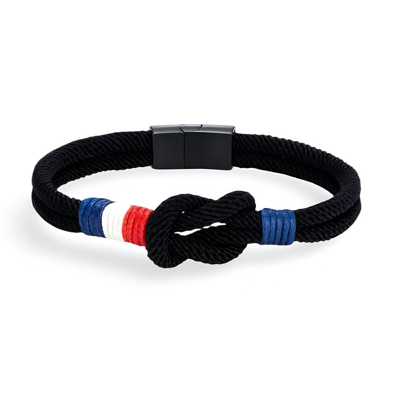 Bracelet cordon noir avec noeud et drapeau français en rouge, blanc, bleu, fermoir métallique noir mat.