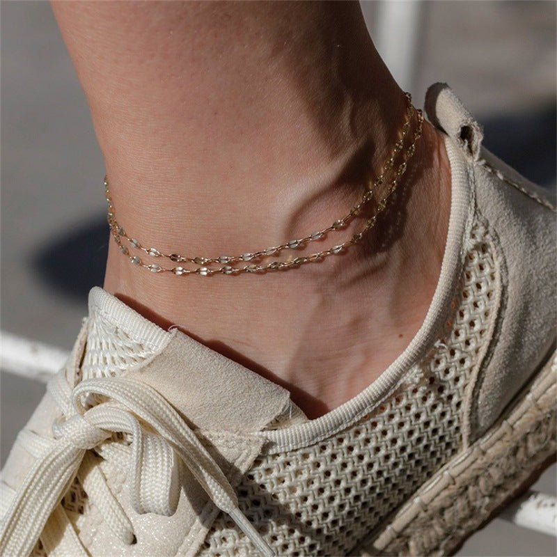 Bracelet de cheville double rang en acier inoxydable or, maille grain de café délicate.