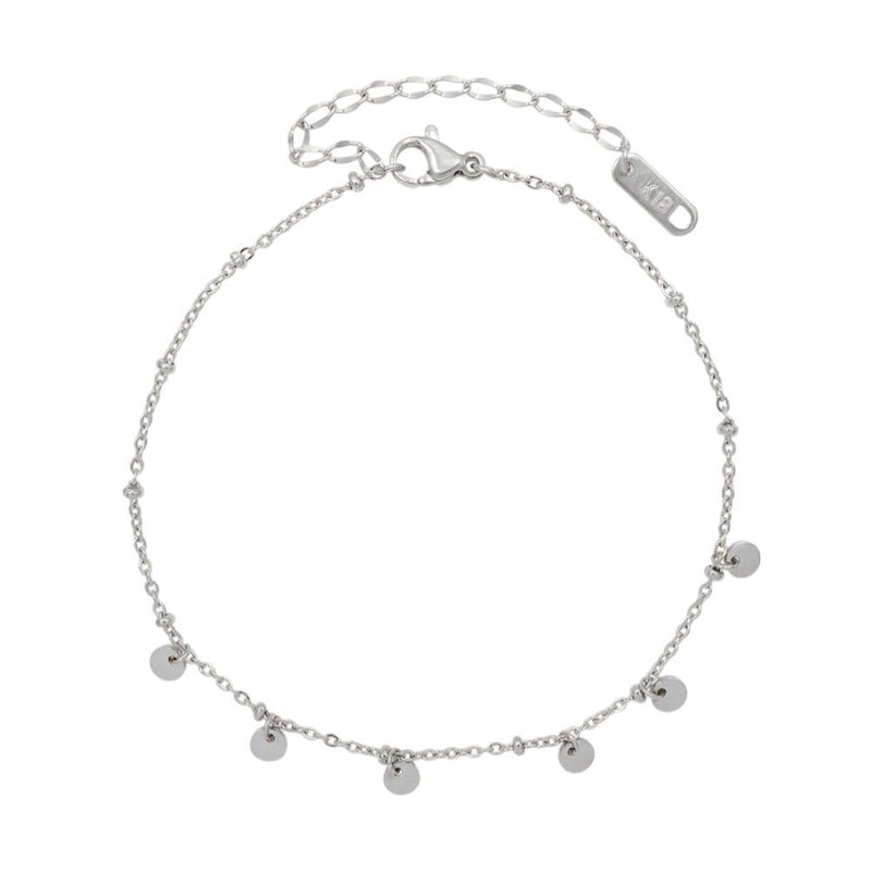 Bracelet de cheville en titane argenté avec cinq médaillons ronds suspendus et chaîne réglable.