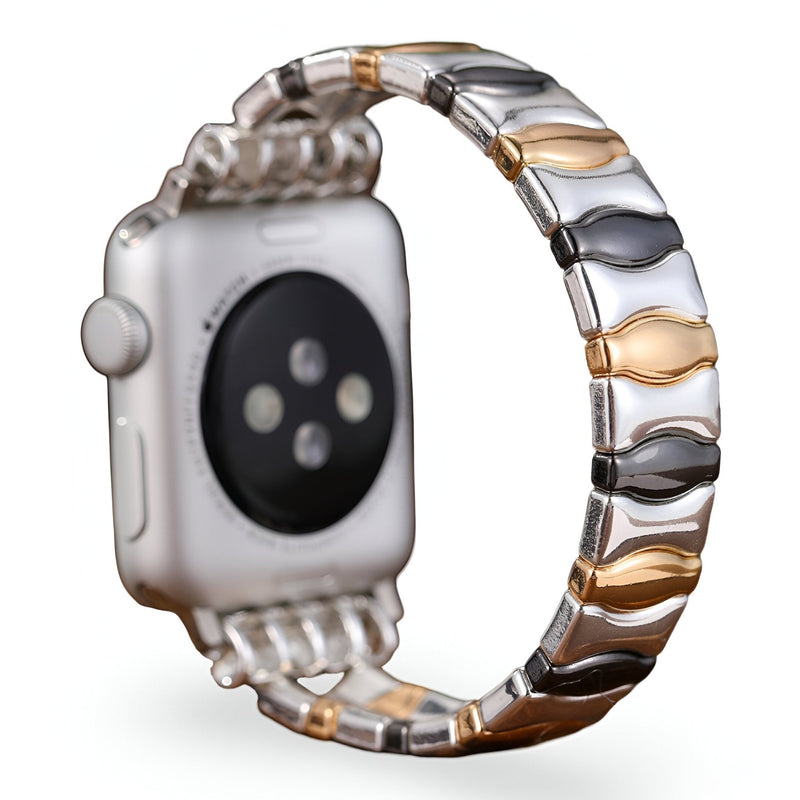 Bracelet métallique pour Apple Watch femme, maillons argent, or et noir, design élégant Dolores.