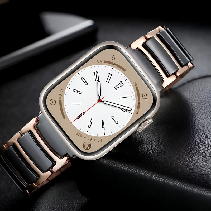 Bracelet Apple Watch Delta en acier inoxydable noir et or rosé avec maillons larges et finitions polies.