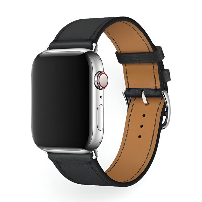 Bracelet Apple Watch en cuir noir avec boucle argentée, intérieur marron clair, style classique.