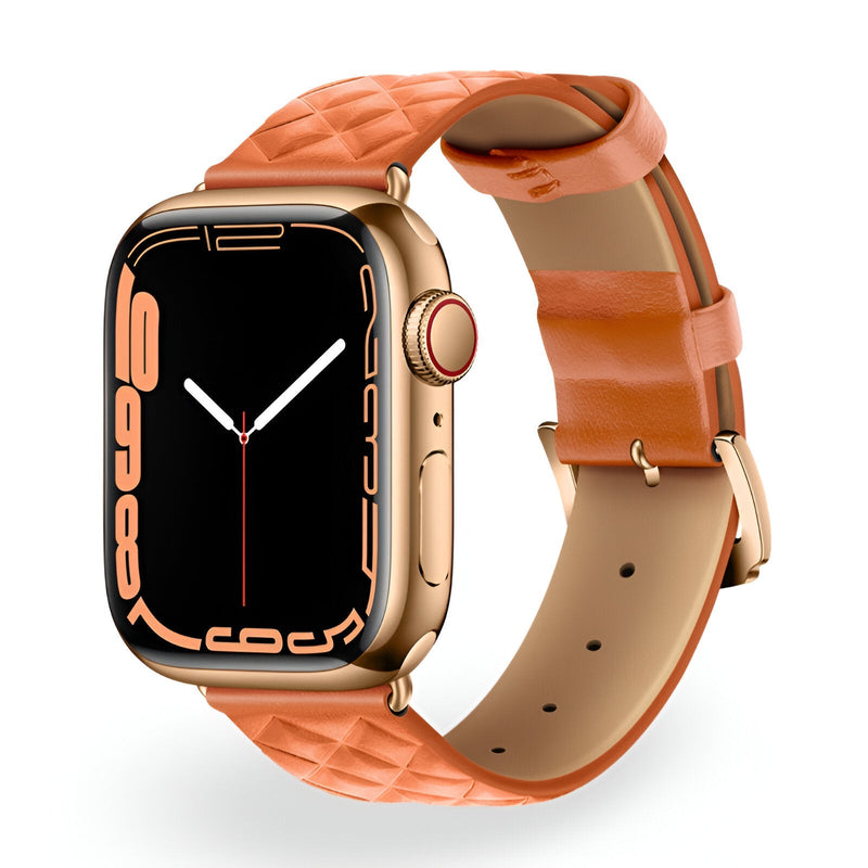 Bracelet en cuir cognac matelassé pour Apple Watch avec boucle ardillon dorée.