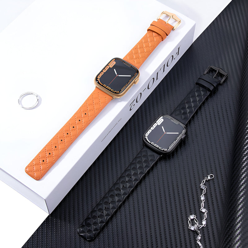 Bracelet Apple Watch cuir orange avec couture apparente et boucle dorée, taille 38-42 mm, côté noir mat avec boucle noire.