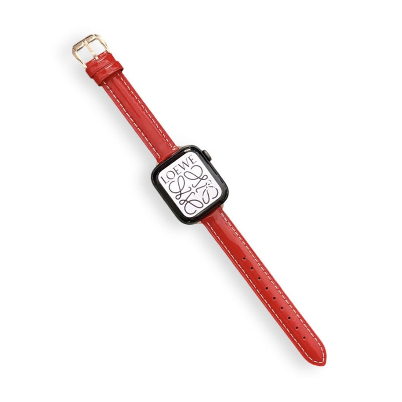 Bracelet Apple Watch en cuir rouge pour femme avec boucle en métal doré, modèle Dexa.