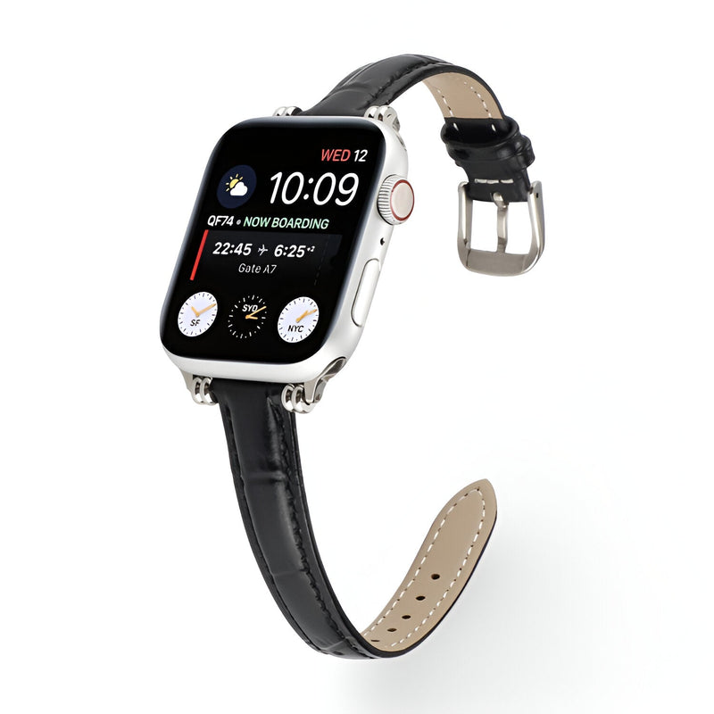 Bracelet Apple Watch en microfibre noir avec boucle argentée, intérieur beige perforé.