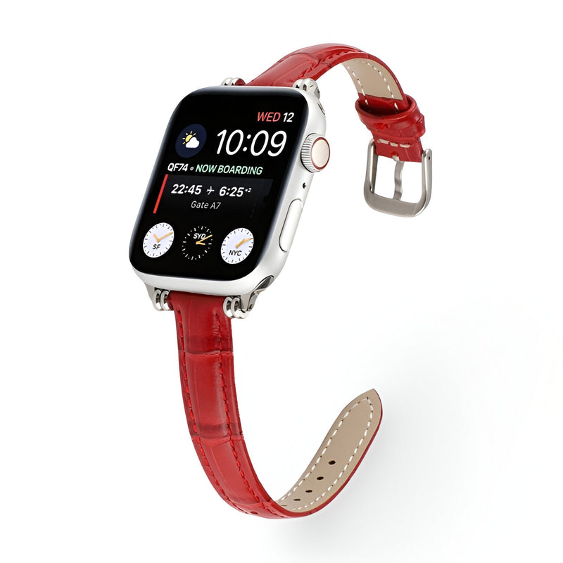 Bracelet Apple Watch en microfibre rouge style croco pour femme avec boucle argentée.