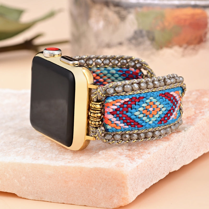 Bracelet Apple Watch bleu en nylon tissé avec perles cristal et accents dorés, modèle Mistral.