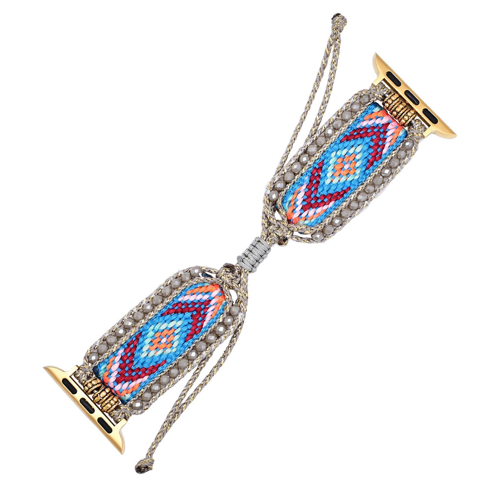 Bracelet Apple Watch en nylon bleu avec motifs géométriques rouges et blancs, fermoirs dorés.