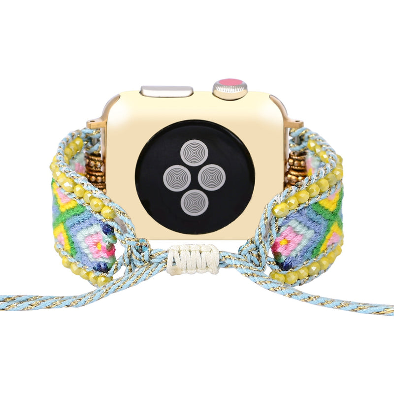 Bracelet Apple Watch en nylon tressé vert, bleu et jaune avec cristaux, style ethnique pour femme.