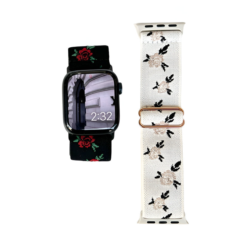 Bracelet Apple Watch en nylon noir avec fleurs rouges et bracelet blanc à motifs floraux beiges et noirs.
