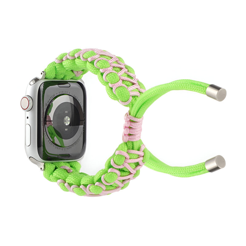 Bracelet Apple Watch en nylon vert fluo avec détails rose pastel et fermoirs métalliques argentés.