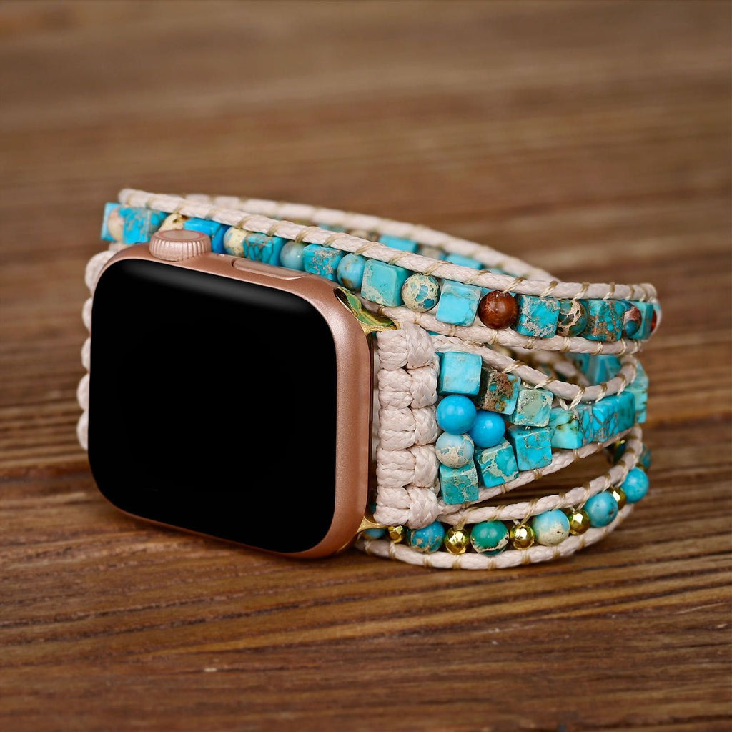 Bracelet Apple Watch femme en pierre de l'empereur bleu avec tissage et perles turquoise et dorées.