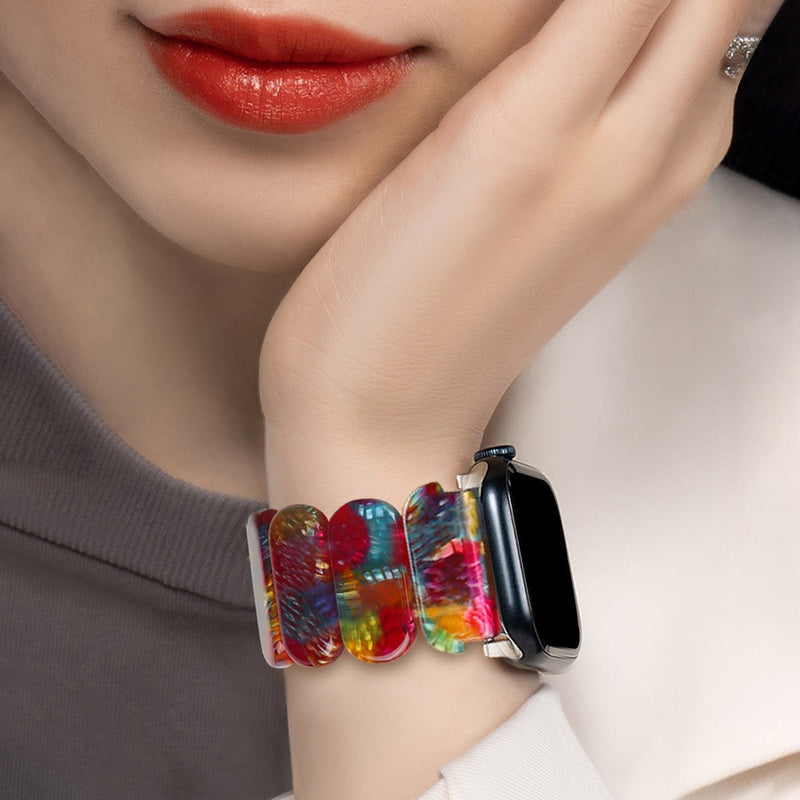 Bracelet Apple Watch en résine multicolore avec motifs floraux, pour femme, modèle Ilya.