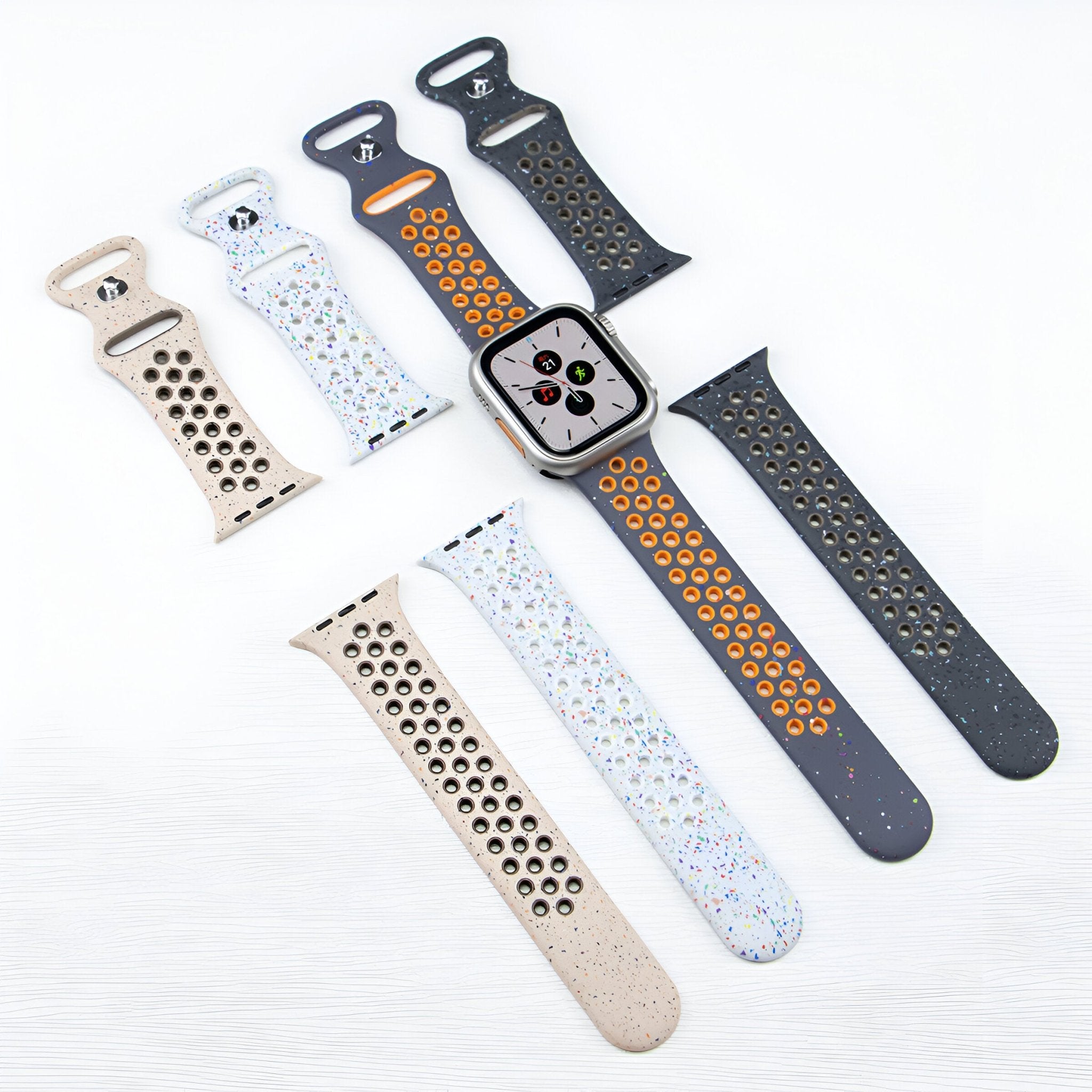 Bracelets Apple Watch en silicone perforé, couleurs noir, beige et blanc, modèle Nyro, mixte, tailles variées.