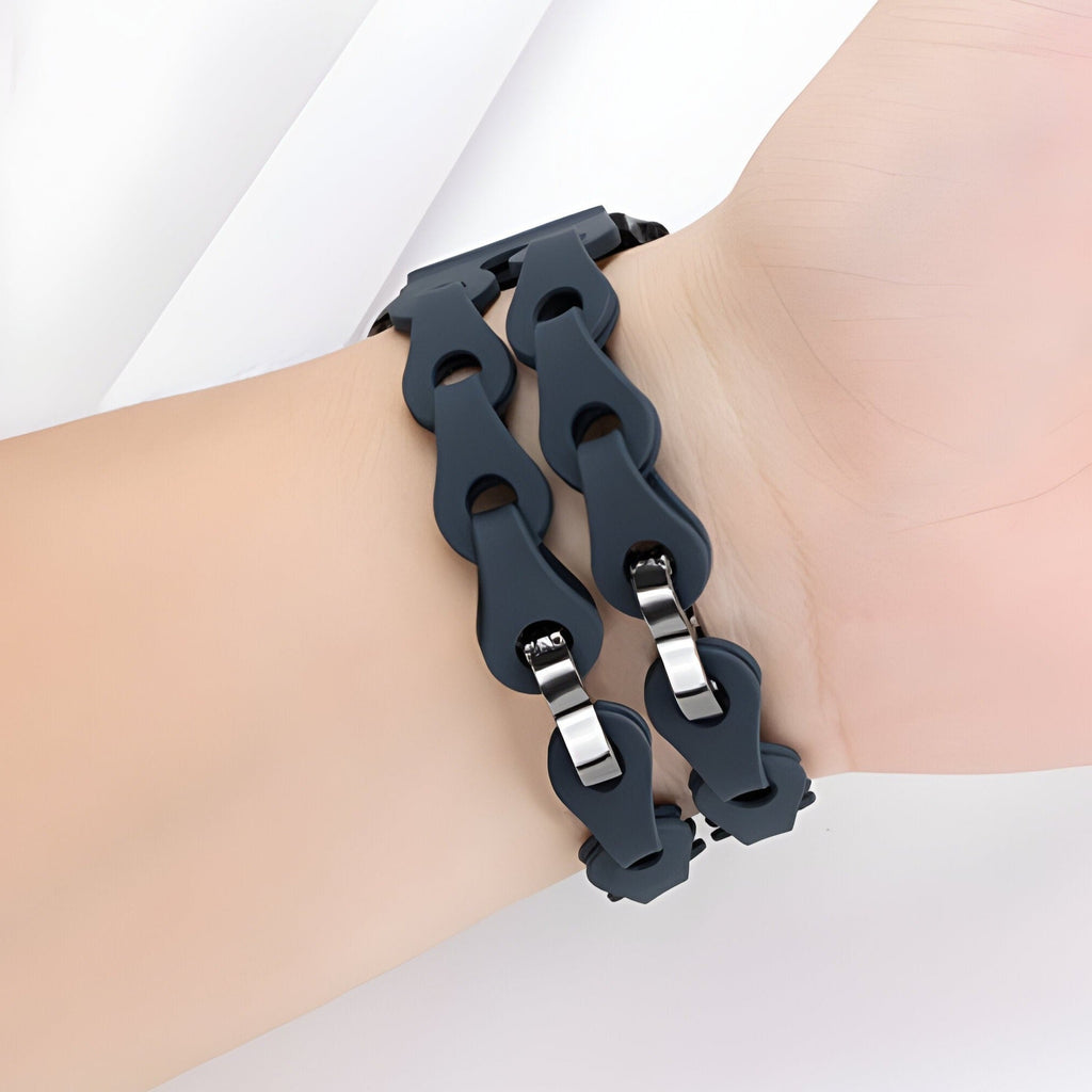 Bracelet Apple Watch en silicone noir mixte modèle Vexa avec maillons larges et fermoir métallique double.