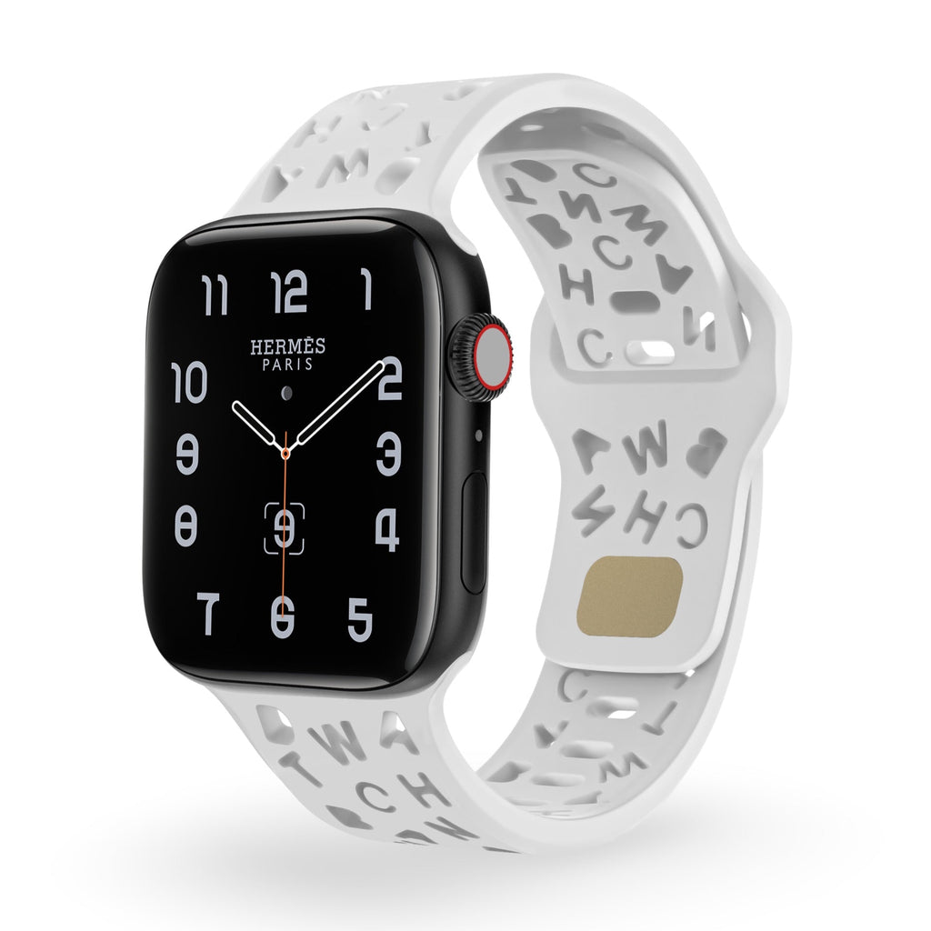 Bracelet Apple Watch en silicone blanc avec motifs de lettres gravés, style perforé et moderne.